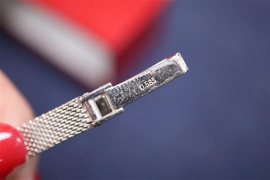 An Anker 14k white gold cocktail watch, with diamond chips set case, boxed